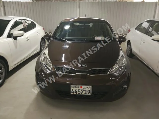 Kia  Rio  2013  Hatchback  Automatic  4  75,000  FWD  Brown  Gasoline