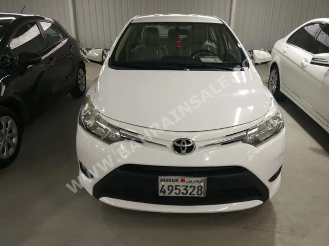 Toyota  Yaris  2015  Sedan  Automatic  4  42,000  FWD  White  Gasoline
