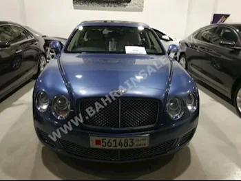 Bentley  Flying Springs  2010  Sedan  Automatic  12  90,000  AWD  Blue  Gasoline
