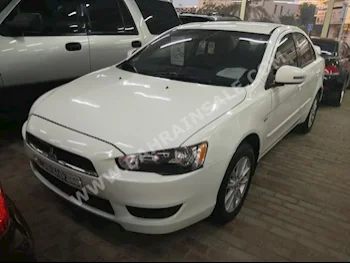 Mitsubishi  Lancer  2015  Sedan  Automatic  4  75,000  FWD  White  Gasoline