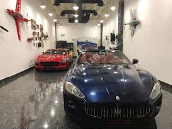 Maserati  Grancabrio  Sport  2012  Coupe / Sport  Automatic  8  104,000  RWD  Dark Blue  Gasoline