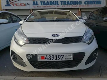 Kia  Rio  2013  Hatchback  Automatic  4  50,000  FWD  White  Gasoline