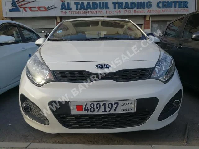 Kia  Rio  2013  Hatchback  Automatic  4  50,000  FWD  White  Gasoline