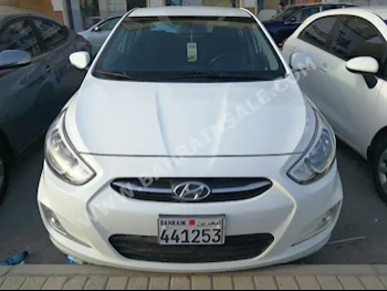 Hyundai  Accent  2015  Sedan  Automatic  4  45,000  FWD  White  Gasoline