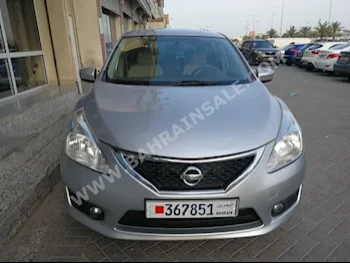 Nissan  Tiida  2014  Sedan  Automatic  4  65,000  4WD  Silver  Gasoline