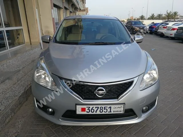 Nissan  Tiida  2014  Sedan  Automatic  4  65,000  4WD  Silver  Gasoline