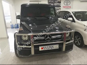 مرسيدس - بنز  جي - كلاس  63 AMG  2001  اس يو في  اتوماتك  8  135,000  دفع رباعي  أسود  بنزين