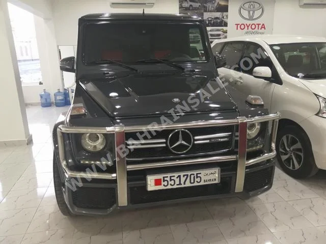 مرسيدس - بنز  جي - كلاس  63 AMG  2001  اس يو في  اتوماتك  8  135,000  دفع رباعي  أسود  بنزين
