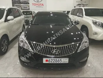 هيونداي  ازيرا  2014  سيدان  اتوماتك  6  14,000  دفع أمامي  أسود  بنزين