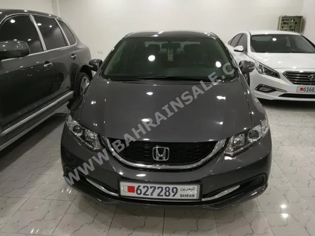 Honda  Civic  2015  Sedan  Automatic  4  50,000  FWD  Gray  Gasoline