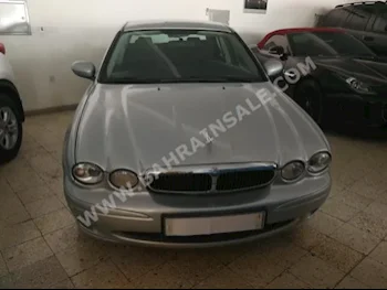 Jaguar  X-Type  2007  Sedan  Automatic  6  85,000  FWD  Silver  Gasoline