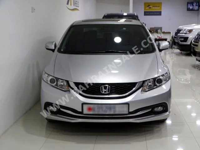 Honda  Civic  2014  Sedan  Automatic  4  51,000  FWD  Silver  Gasoline