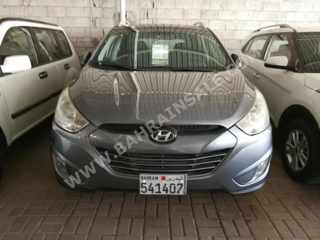 Hyundai  Tucson  2012  SUV  Automatic  4  120,000  FWD  Gray  Gasoline