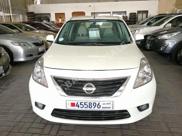 Nissan  Sunny  2013  Sedan  Automatic  4  92,000  FWD  Pearl  Gasoline