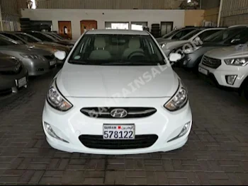 Hyundai  Accent  2015  Sedan  Automatic  4  49,000  FWD  White  Gasoline