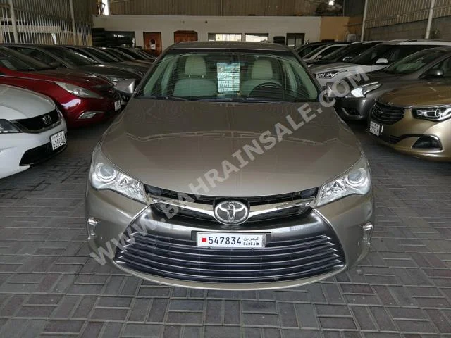 Toyota  Camry  2016  Sedan  Automatic  4  37,000  FWD  Gold  Gasoline