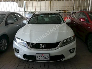 Honda  Accord  Coupe  2014  Coupe / Sport  Automatic  4  97,000  FWD  White  Gasoline