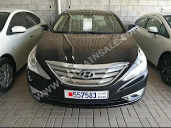 Hyundai  Sonata  2014  Sedan  Automatic  4  65,000  FWD  Black  Gasoline