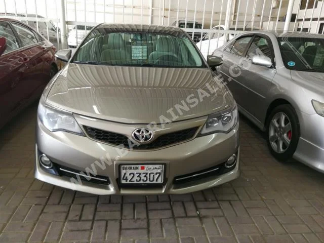 Toyota  Camry  GLX  2012  Sedan  Automatic  4  89,000  FWD  Gold  Gasoline