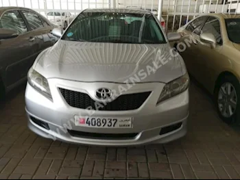 Toyota  Camry  GLX  2009  Sedan  Automatic  4  80,000  FWD  Silver  Gasoline