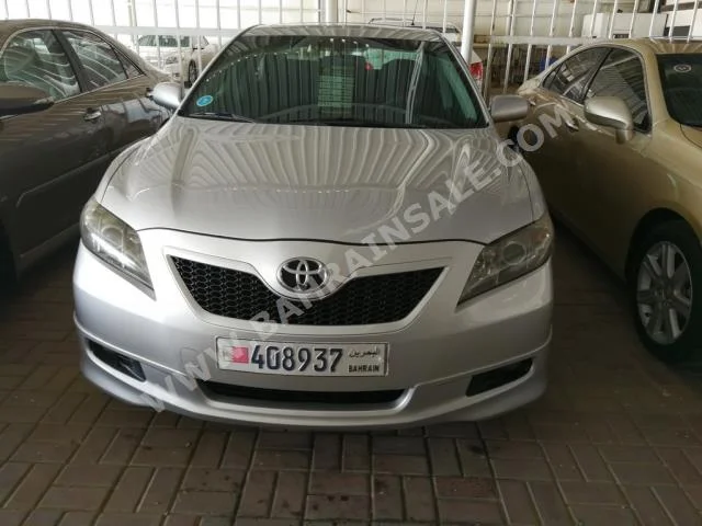 Toyota  Camry  GLX  2009  Sedan  Automatic  4  80,000  FWD  Silver  Gasoline
