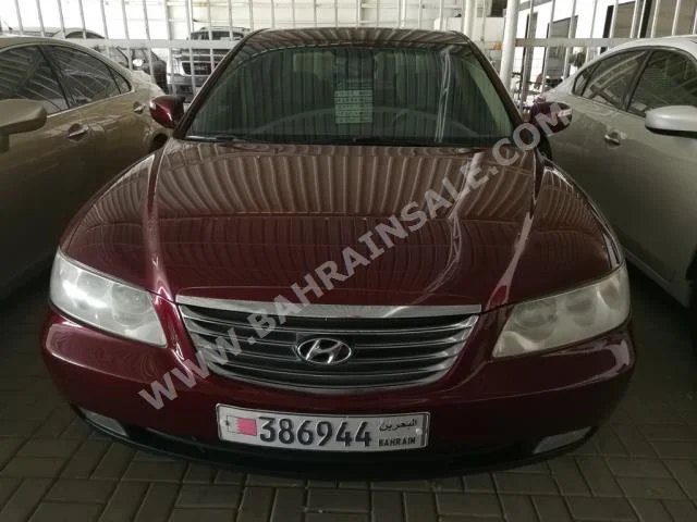 Hyundai  Azera  2009  Sedan  Automatic  4  152,000  FWD  Maroon  Gasoline