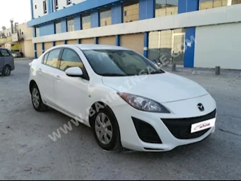 Mazda  Mazda 3  2011  Sedan  Automatic  4  138,000  FWD  White  Gasoline