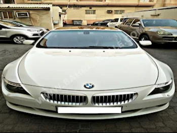 BMW  6-Series  630i  2012  Coupe / Sport  Automatic  6  143,000  FWD  White  Gasoline