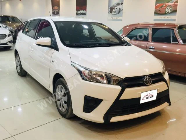 Toyota  Yaris  2015  Hatchback  Automatic  4  72,000  FWD  White  Gasoline