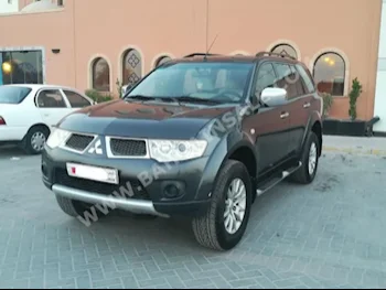 Mitsubishi  Pajero  Sport  2010  Sedan  Automatic  6  129,000  FWD  Gray  Gasoline