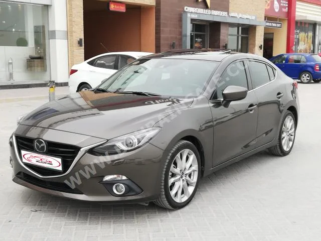 Mazda  Mazda 3  2016  Sedan  Automatic  4  29,000  FWD  Gray  Gasoline