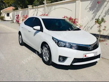 Toyota  Corolla  XLI  2015  Sedan  Automatic  4  62,000  FWD  White  Gasoline