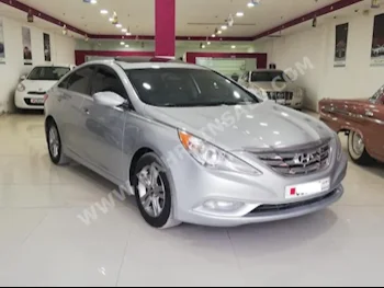 Hyundai  Sonata  2013  Sedan  Automatic  4  98,000  FWD  Silver  Gasoline