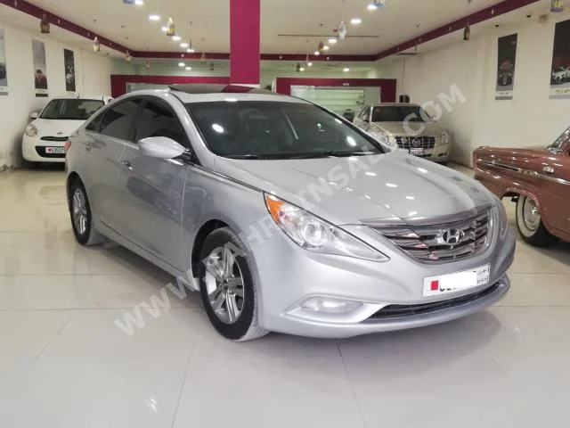 Hyundai  Sonata  2013  Sedan  Automatic  4  98,000  FWD  Silver  Gasoline