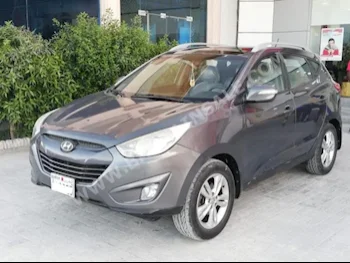 Hyundai  Tucson  2013  SUV  Automatic  4  82,000  FWD  Gray  Gasoline