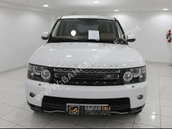 Land Rover  Range Rover  Sport Super charged  2012  SUV  Automatic  8  84,000  4WD  White  Gasoline