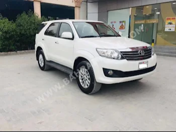 Toyota  Fortuner  2015  SUV  Automatic  4  67,000  4WD  White  Gasoline