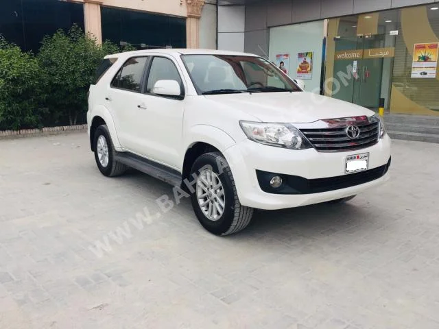 Toyota  Fortuner  2015  SUV  Automatic  4  67,000  4WD  White  Gasoline