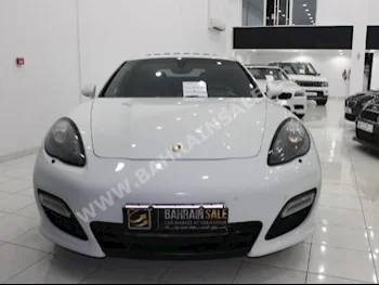 Porsche  Panamera  GTS  2013  Sedan  SMG  8  82,000  RWD  White  Gasoline