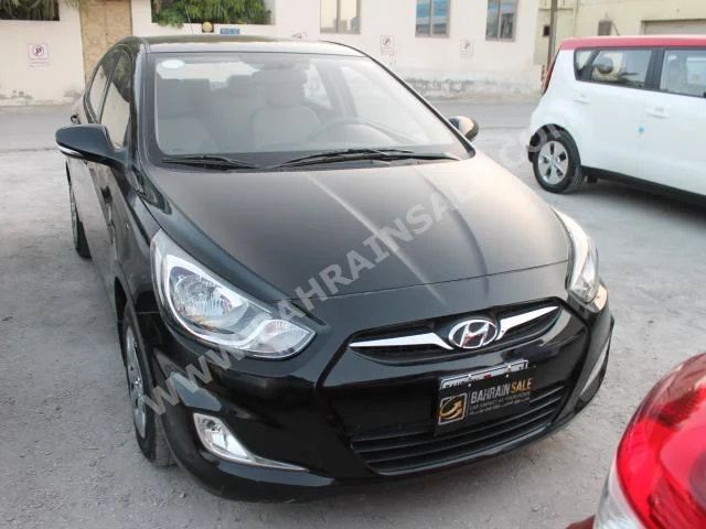 Hyundai  Accent  2014  Sedan  Automatic  4  62,000  FWD  Black  Gasoline