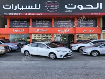 Toyota  Yaris  2015  Sedan  Automatic  4  120,000  FWD  Pearl  Gasoline