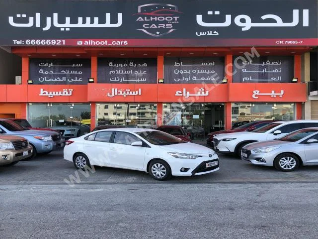 Toyota  Yaris  2015  Sedan  Automatic  4  120,000  FWD  Pearl  Gasoline