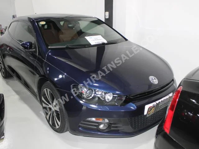 Volkswagen  Scirocco  2015  Hatchback  Automatic  4  45,000  RWD  Blue  Gasoline