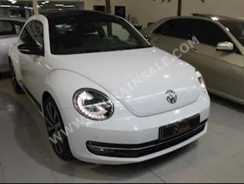 Volkswagen  Beetle  2015  Sedan  Automatic  4  58,000  RWD  White  Gasoline