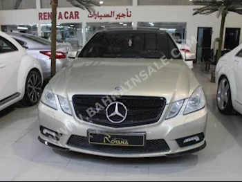 Mercedes-Benz  E-Class  300  2011  Sedan  Automatic  6  123,000  RWD  Gold  Gasoline