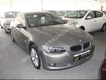 BMW  3-Series  320i  2009  Sedan  Automatic  4  49,000  RWD  Gray  Gasoline