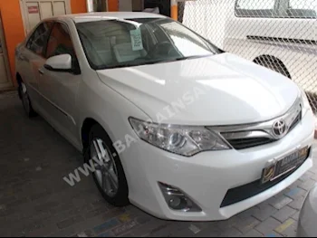 Toyota  Camry  GLX  2014  Sedan  Automatic  4  59,000  FWD  White  Gasoline