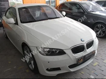 BMW  3-Series  335i  2010  Convertible  Automatic  6  63,000  RWD  White  Gasoline