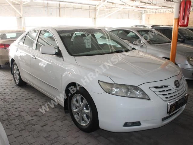 Toyota  Camry  GLX  2009  Sedan  Automatic  4  127,000  FWD  White  Gasoline