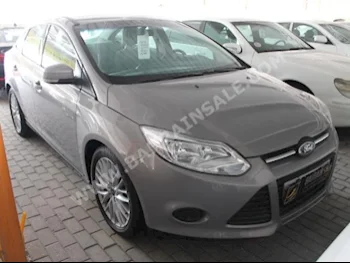 Ford  Focus  2014  Sedan  Automatic  4  5,000  FWD  Silver  Gasoline